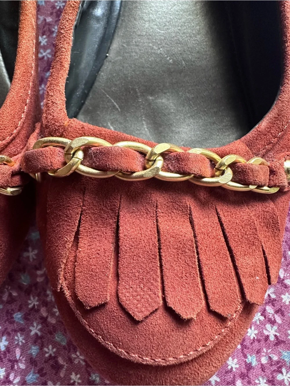 Monet Rust Suede Fringe Loafers with Gold Chain Accent